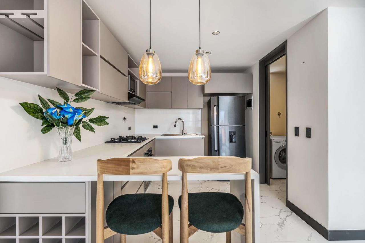 Apartamentos Housy Laureles เมเดยิน ภายนอก รูปภาพ