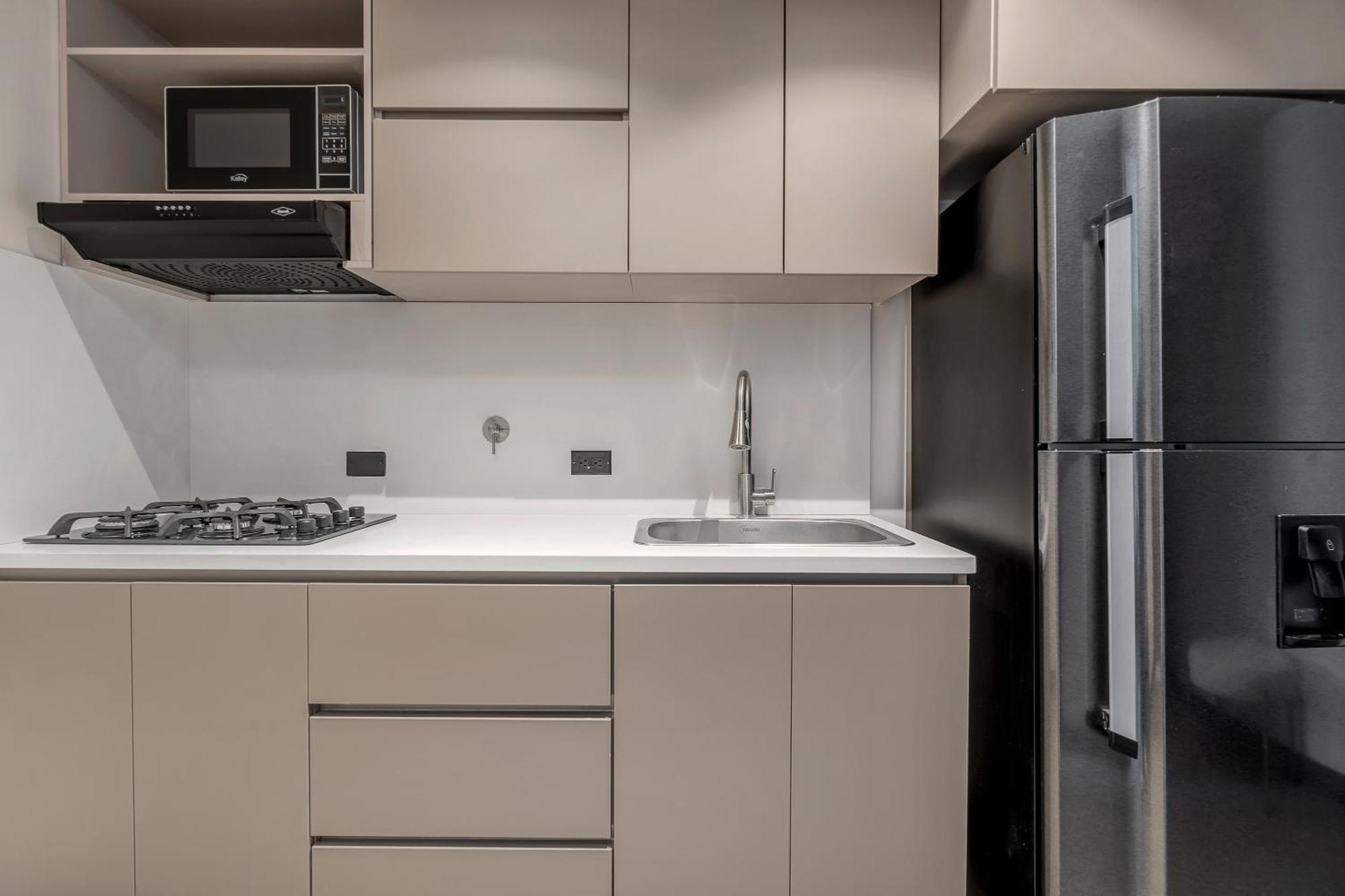 Apartamentos Housy Laureles เมเดยิน ภายนอก รูปภาพ